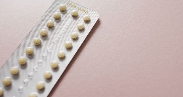 Image of close up of yellow tablets on pink background - Download Free Stock Photos Pikwizard.com