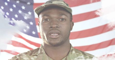 Uniformed service member speaking before American flag patriotic portrait for ceremony and leadershi