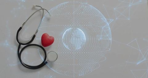 Stethoscope and Red Heart with Digital Globe Hologram Symbolizing Telemedicine