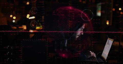 Hacker in Darkroom Breaking Cybersecurity with Laptop - Download Free Stock Images Pikwizard.com
