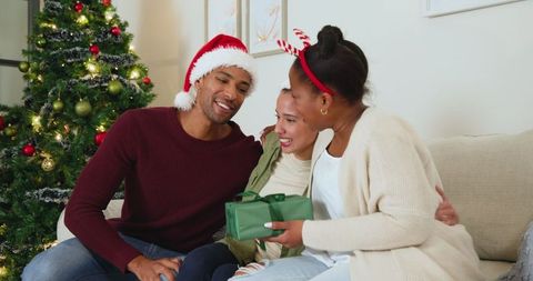 African American Family Celebrating Christmas Together at Home