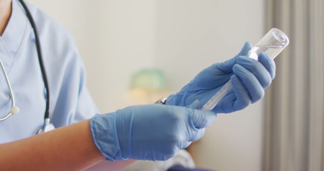 Medical Professional Holding Test Tube with Protective Gloves - Download Free Stock Images Pikwizard.com