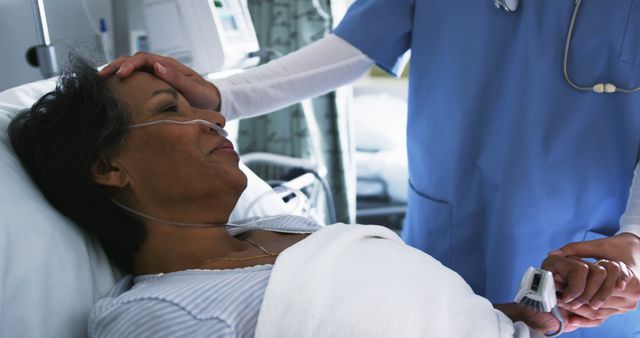 Senior patient lying on hospital bed receiving care and reassurance from a nurse. Nurse gently touching patient's forehead and holding hand, showing nurturing and compassionate care. Useful for healthcare-related content, medical facilities advertising, nursing training materials, elder care articles, promoting patient care services, illustrating medical support and improving patient experience.