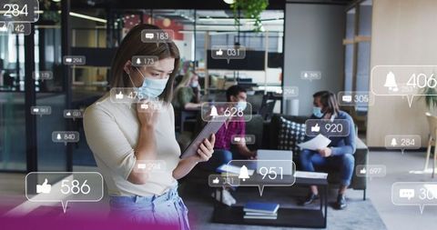 Businesswoman Using Tablet with Social Media Interactions in Modern Office