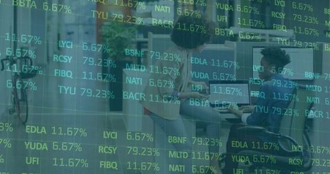 Women Collaborating Over Laptop with Financial Ticker Overlay in Modern Coworking Office