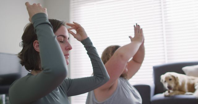 Women Meditating at Home with Dog in Background - Download Free Stock Images Pikwizard.com