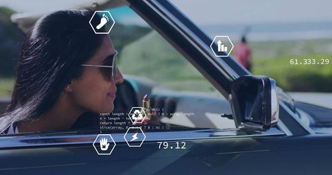 Stylish Woman Driving Convertible Along Sunny Coast With AR Graphics