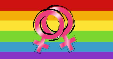 Female symbols on rainbow background celebrating pride