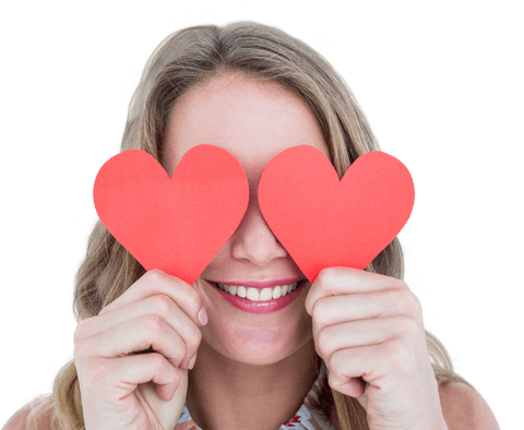 Smiling Woman Holding Red Heart Cutouts with Transparent Background