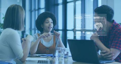 Leading collaborative meeting with holographic data display by diverse young professionals