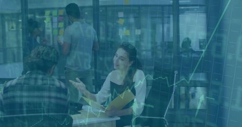 Business Meeting with Dynamic Data Visualization Overlay