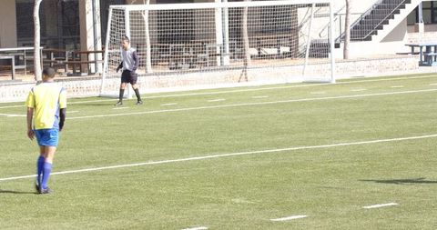 Dynamic Soccer Match in Action on Sunny Outdoor Field