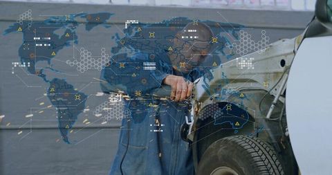 Technician grinding car fender with global network overlay illustrating connected repair