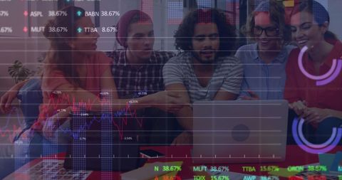 Diverse Team Analyzing Data on Laptop in Modern Workspace