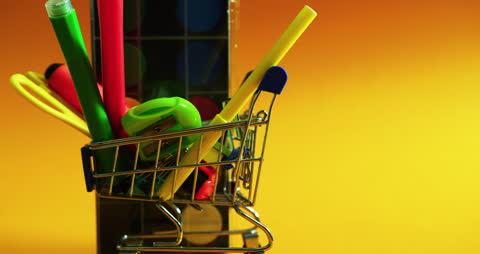Mini Shopping Cart Filled With Vibrant School Stationery