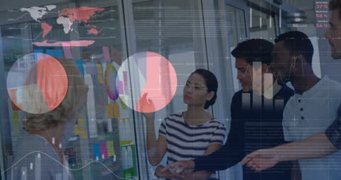 Diverse Team Engaged in Dynamic Data Analysis Collaboration