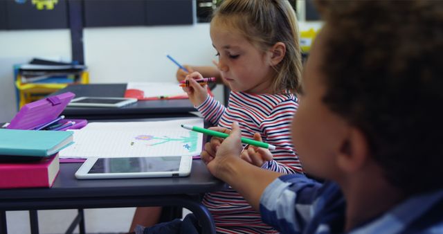 Children Drawing in Classroom with Tablet on Desk - Download Free Stock Images Pikwizard.com