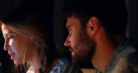 Focused Professionals Collaborating Late at Office