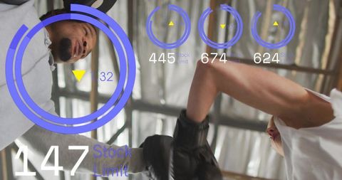 Sparring athletes training with ar fitness hud overlay in industrial gym