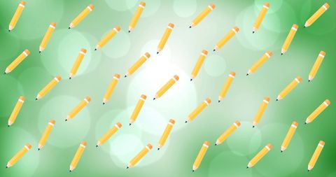 Back to School Sale with Pencils on Green Background