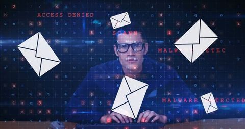 Cybersecurity expert analyzing threats with email warnings