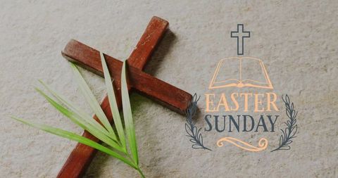 Wooden cross with palm frond and easter sunday lettering on textured stone background