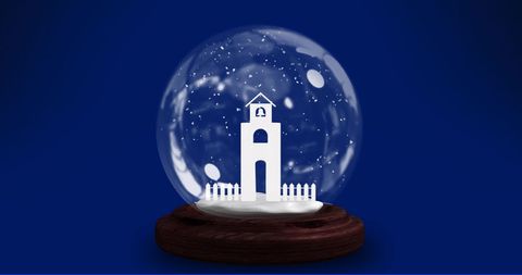 Holiday themed snow globe with church inside