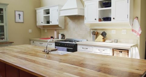 Spacious Modern Kitchen with Wooden Counter Island