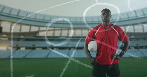 Confident Rugby Player Standing In Sports Stadium With Strategic Overlay