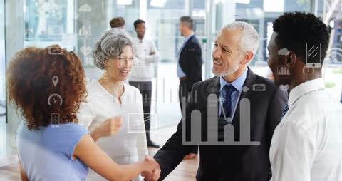 Diverse Business Professionals Shaking Hands with Data Visualization