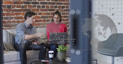 Business Colleagues Analyzing Data with Global Network Overlay