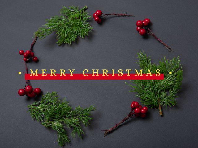 This image features a circular arrangement of evergreen branches and red berries with 'Merry Christmas' text in the center. Ideal for holiday greetings, promotional materials, and seasonal marketing campaigns.