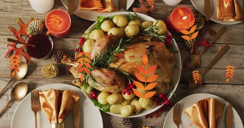 Autumn Leaves Overlay on Cozy Thanksgiving Meal - Download Free Stock Images Pikwizard.com