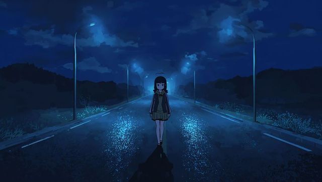 Solitary schoolgirl walking on urban night road