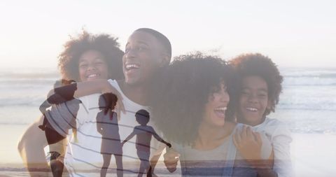 Joyful African American Family Enjoying Beach Time
