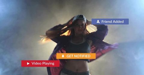 Dynamic Dancer with Digital Overlay Icons in Smoke-Lit Studio