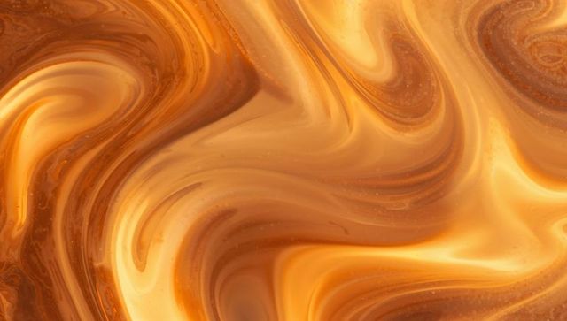 Amber gold marble swirls flowing like viscous paint glossy metallic honey texture