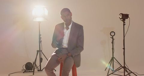 Elegant African American Man Posing in Photography Studio Lighting
