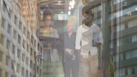 Business Professionals Collaborating Over Project