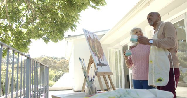 Senior Couple Enjoying Outdoor Painting Session on Balcony - Download Free Stock Images Pikwizard.com