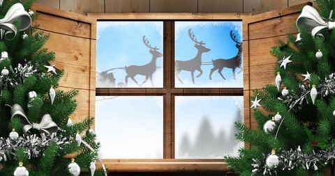 Santa Sleigh Silhouette Seen Through Frosty Window
