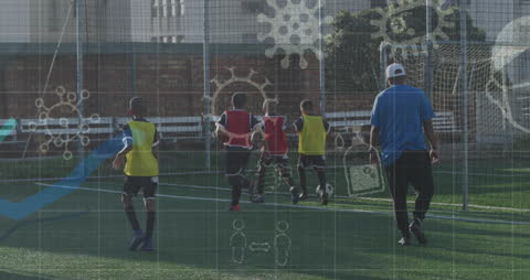 Children Playing Soccer With Health Icons Overlay Amid Pandemic