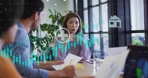 Multicultural Business Team Analyzing Emerging Technology Icons