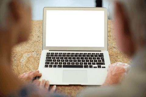 Elderly Couple Using Laptop with Transparent Screen at Home - Download Free Stock Videos Pikwizard.com