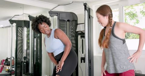 Diverse Women Engaging in a Fun Workout Session at Gym