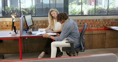 Colleagues Collaborating on Office Project