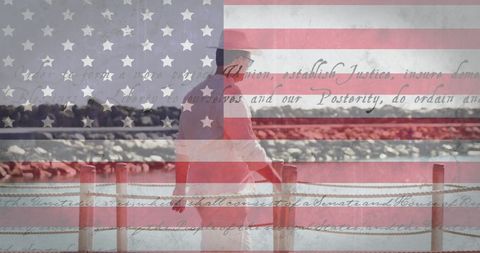 Man Walking on Jetty Symbolizing American Freedom and Patriotism