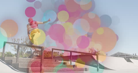 Dynamic Skateboarding with Colorful Digital Shapes Overlay