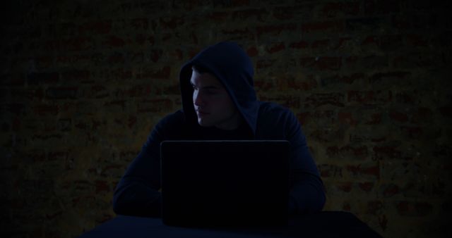 Hacker Working on Laptop in Dark and Mysterious Space - Download Free Stock Images Pikwizard.com