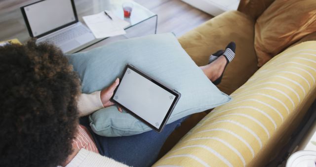 Woman Using Digital Tablet on Comfy Sofa in Cozy Living Room - Download Free Stock Images Pikwizard.com